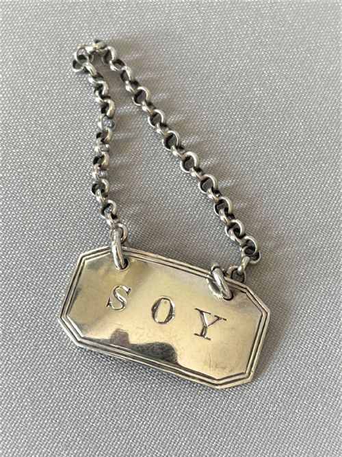 A Desirable Silver 'Soy' Bottle Ticket
