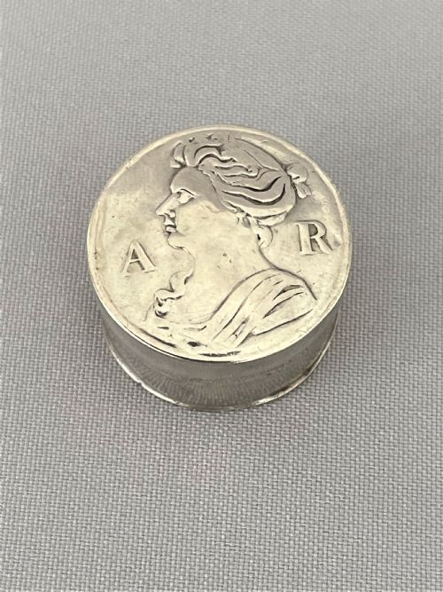 fig 1. An extremely rare queen Anne silver counter/patch box