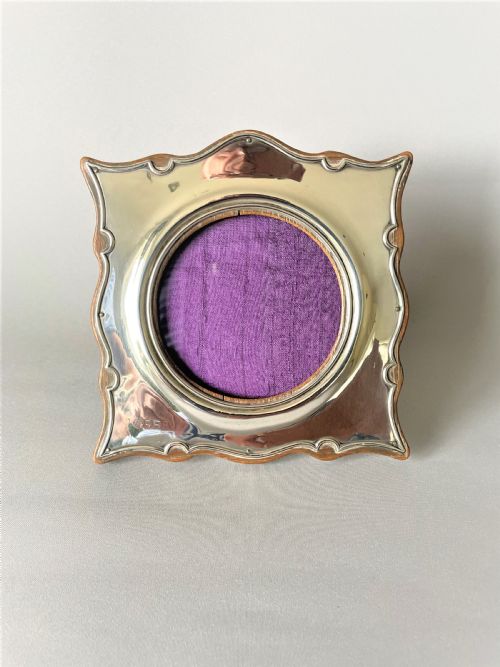 fig 1. A charming shaped Edwardian silver photo frame