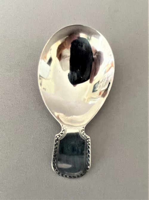 A Delightful Georgian Silver Caddy Spoon