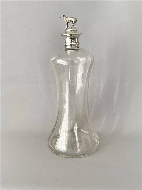 A Rare Victorian Silver Mounted Decanter with Greyhound Stopper