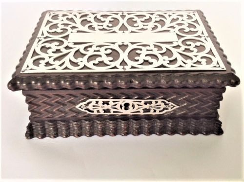 A Silver Mounted Carved Wood Jewel Box