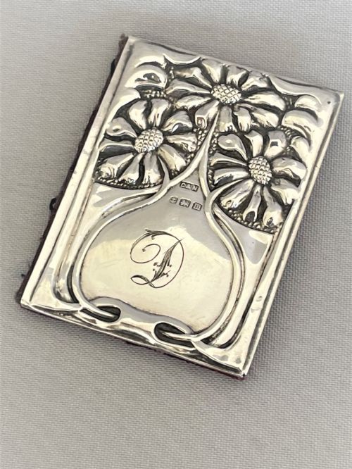 A Charming Art Nouveau Silver Mounted Needle Book