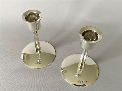 fig 1. A stylish pair of third height silver candlesticks
