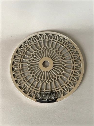 fig 1. A lovely silver mounted teapot stand or coaster