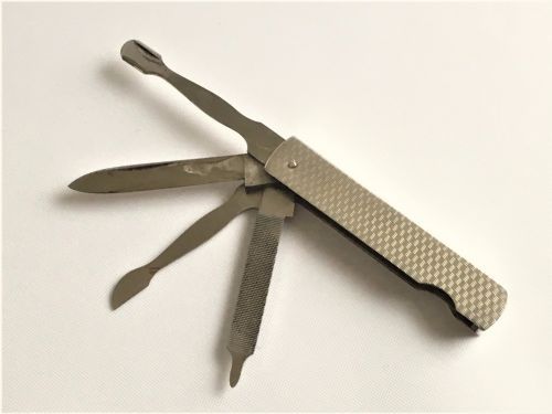 A Lovely Art Deco Silver Folding Manicure Set