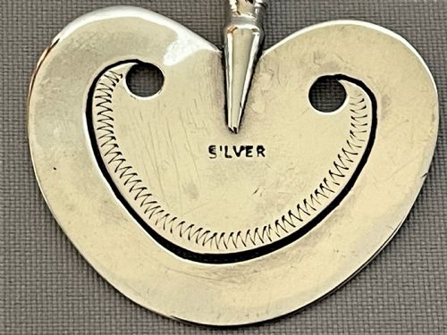 fig 1. A charming heart shaped silver bookmark