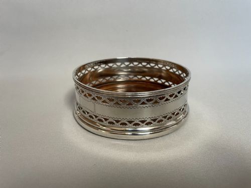 fig 1. A hallmarked silver wine bottle/decanter coaster
