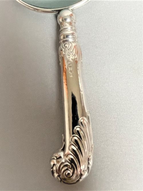 fig 1. An Edwardian silver pistol grip handle magnifying glass
