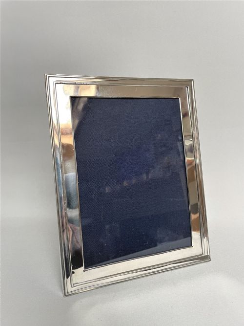 A Large Silver Photo Frame with Unusual Silver Mount