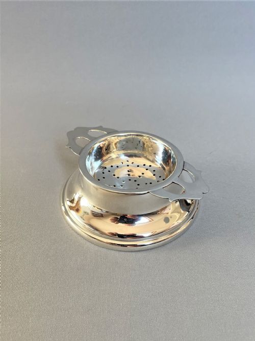 A Fine Hallmarked Silver Tea Strainer & Drip Cup