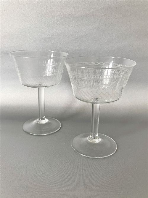An Elegant Pair of Edwardian Etched Champagne Coupes