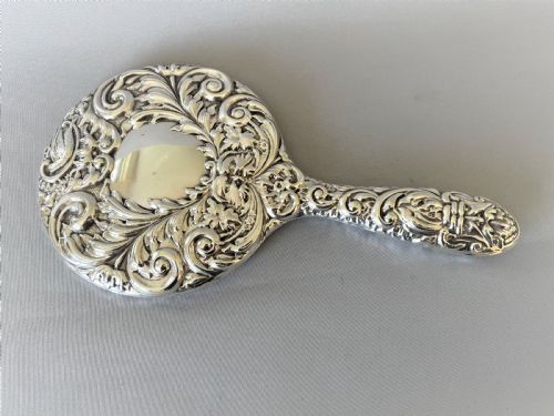 A Gorgeous Vintage Silver Hand Mirror