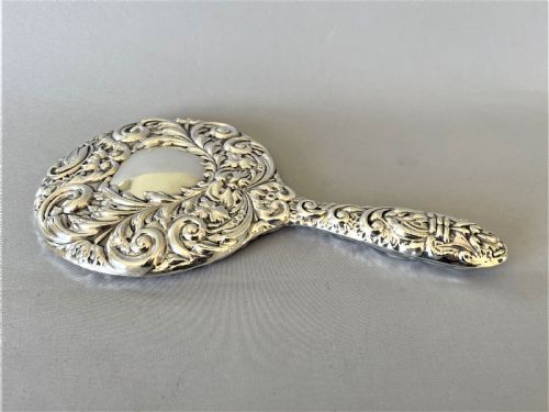 fig 1. A gorgeous vintage silver hand mirror