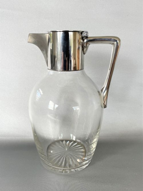 A Hukin & Heath Stylish Silver Mounted Claret Jug
