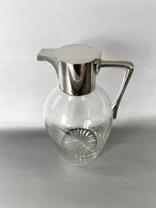fig 1. A Hukin & Heath stylish silver mounted claret jug