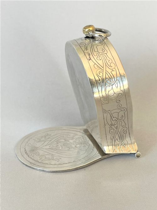 fig 2. A superb Victorian silver travelling watch case/clock