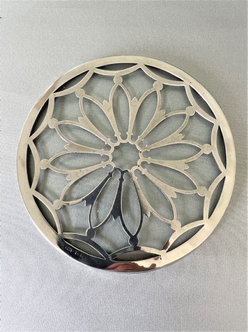 fig 1. A gorgeous silver mounted teapot stand/coaster