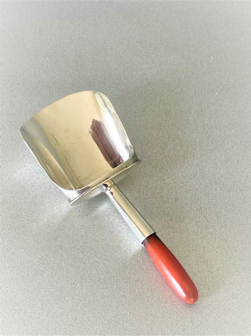 A Georgian Silver & Coral Caddy Shovel. Female Silversmith.