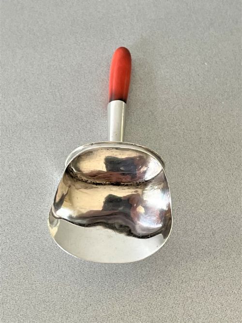 fig 1. A Georgian silver & coral caddy shovel. Female silversmith.