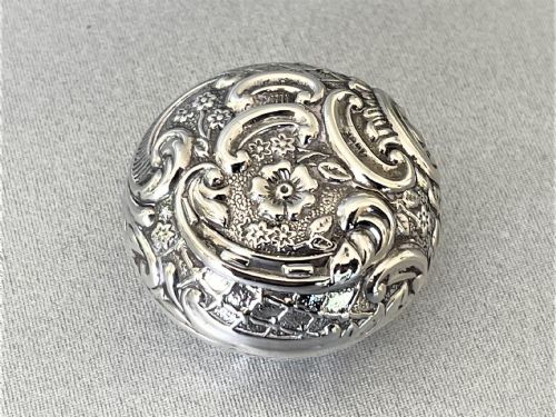 fig 1. An unusual Edwardian silver repousse pill box