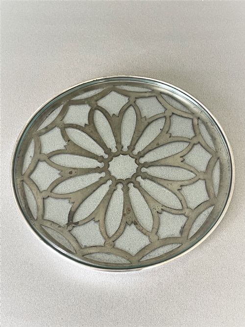 fig 1. A delightful small silver teapotstand/coaster