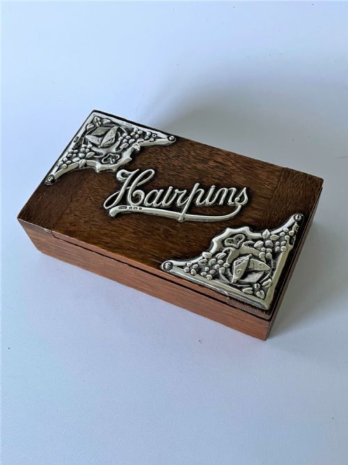 An Edwardian Silver Mounted Hairpins Box