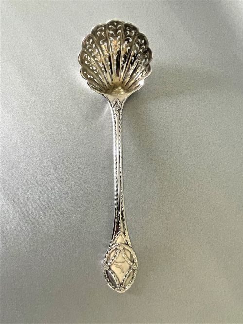 A Fully Cast Victorian Silver Sugar Sifting Ladle