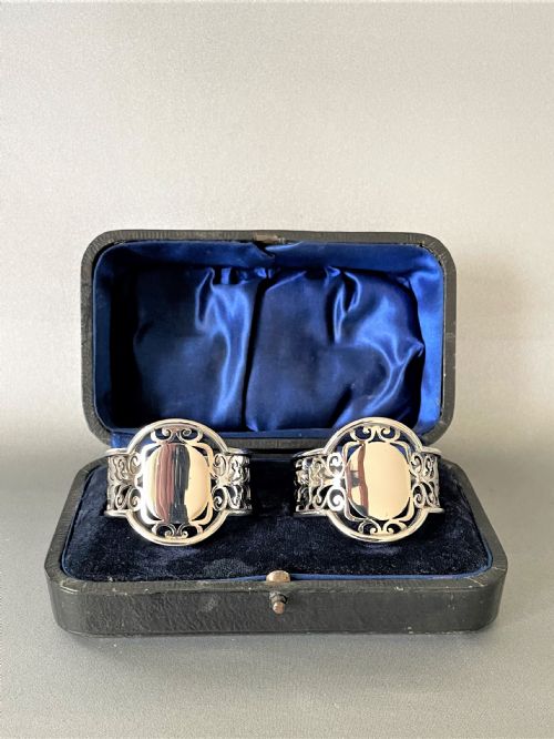 A Fabulous Pair of Boxed, Pierced Silver Napkin Rings