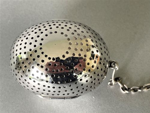 fig 1. A rare Victorian silver 'egg' tea infuser