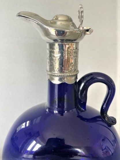 fig 1. An early Victorian Bristol Blue wine jug with silver plated mount