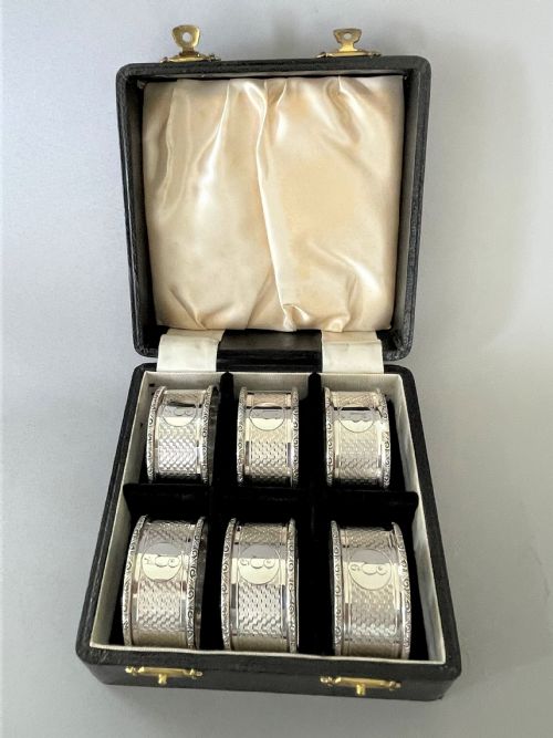 A Set of 6 Boxed Art Deco Silver Napkin Rings