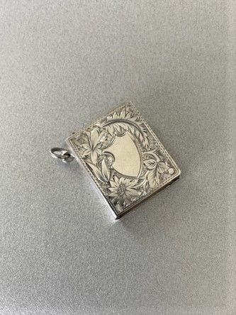 A Superb Novelty Edwardian Silver 'Book' Stamp Case