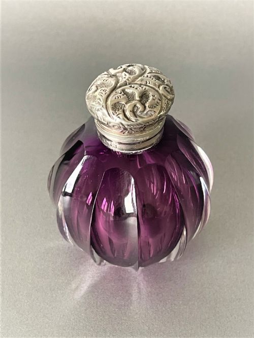 fig 1. A stunning Victorian silver topped amethyst glass scent bottle
