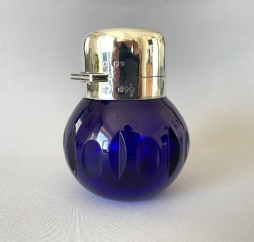 A Gorgeous Victorian Silver Mounted Cologne Bottle