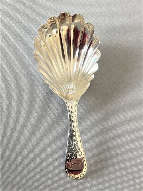 An 18th Century Bright Cut Silver Caddy Spoon