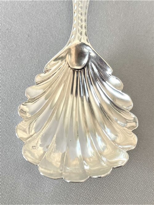 fig 1. An 18th Century Bright Cut Silver Caddy Spoon