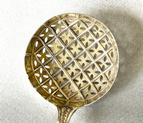 fig 1. A fine George Adams Victorian silver gilt sifting ladle