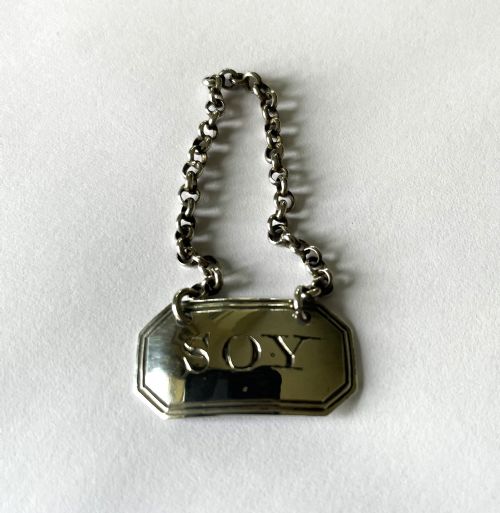 fig 1. A fine Georgian silver 'Soy' bottle ticket