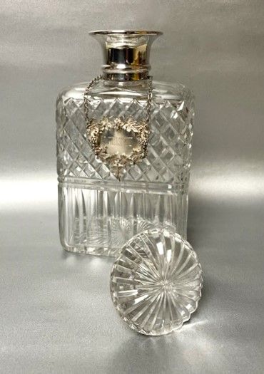 fig 1. A stunning silver mounted Whisky decanter & label