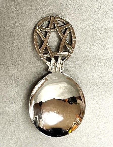fig 1. A superb A E Jones Arts & Crafts silver caddy spoon