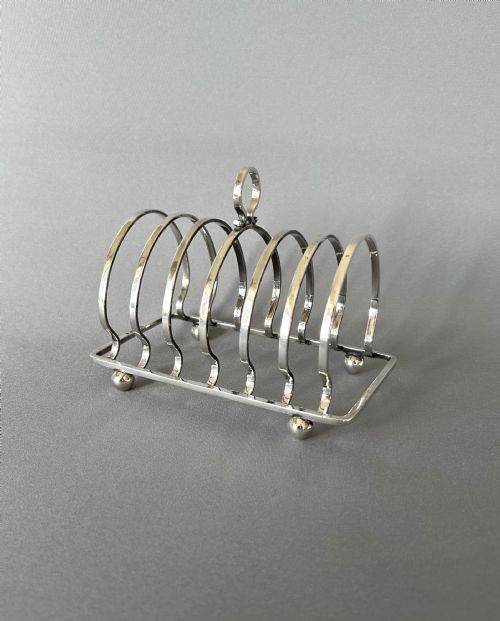 fig 1. A handsome 6 slice silver toast rack