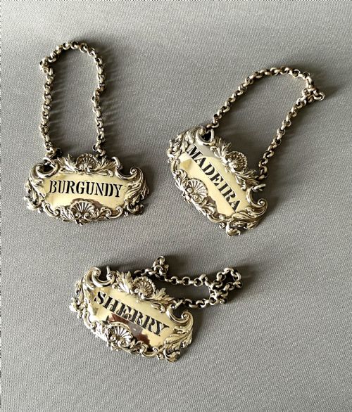 A Superb Set of 3 Early Victorian Silver Decanter Labels