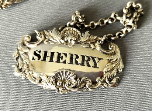 fig 1. A superb set of 3 early Victorian silver decanter labels
