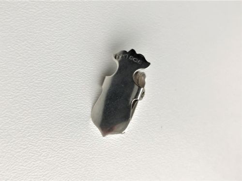 fig 1. A delightful Edwardian silver napkin clip