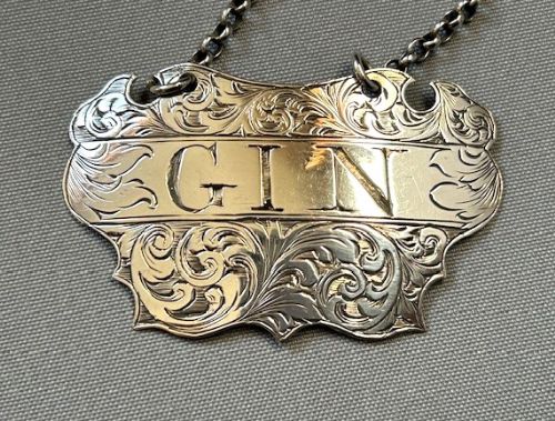 fig 1. An early Victorian 'escutcheon' form Gin label