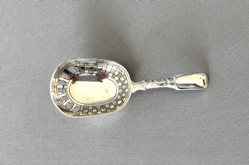 fig 1. An unusual Georgian pierced bowl caddy spoon