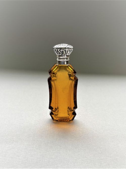 An Unusual Victorian Silver Mounted Amber Glass Scent Bottle