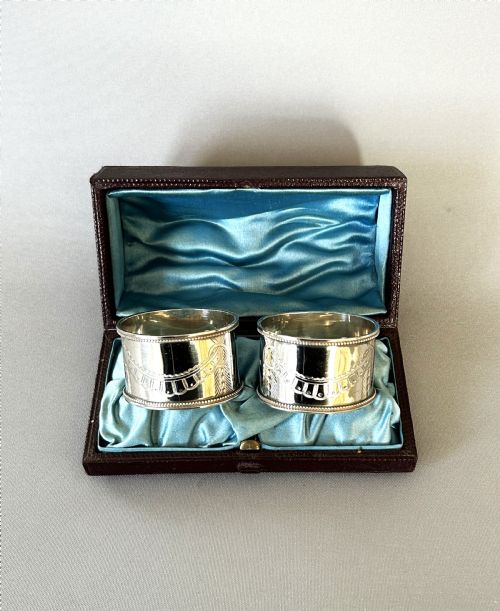 A Rare Pair of Victorian Boxed Silver Napkin Rings