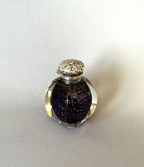 A Fabulous Victorian Silver Mounted Scent Bottle with Gold Leaf
